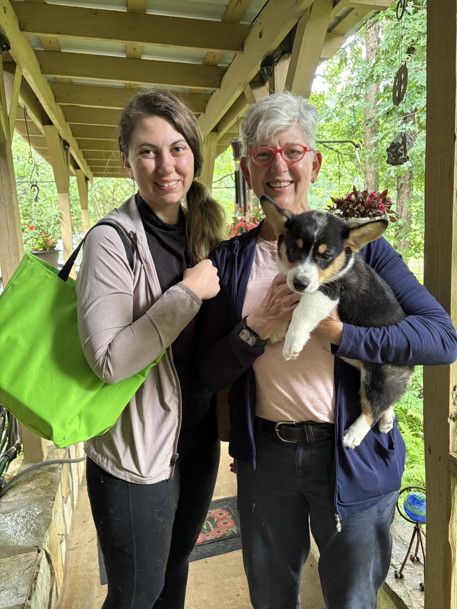 Family with new male tri-color pembroke welsh corgi puppy in NC