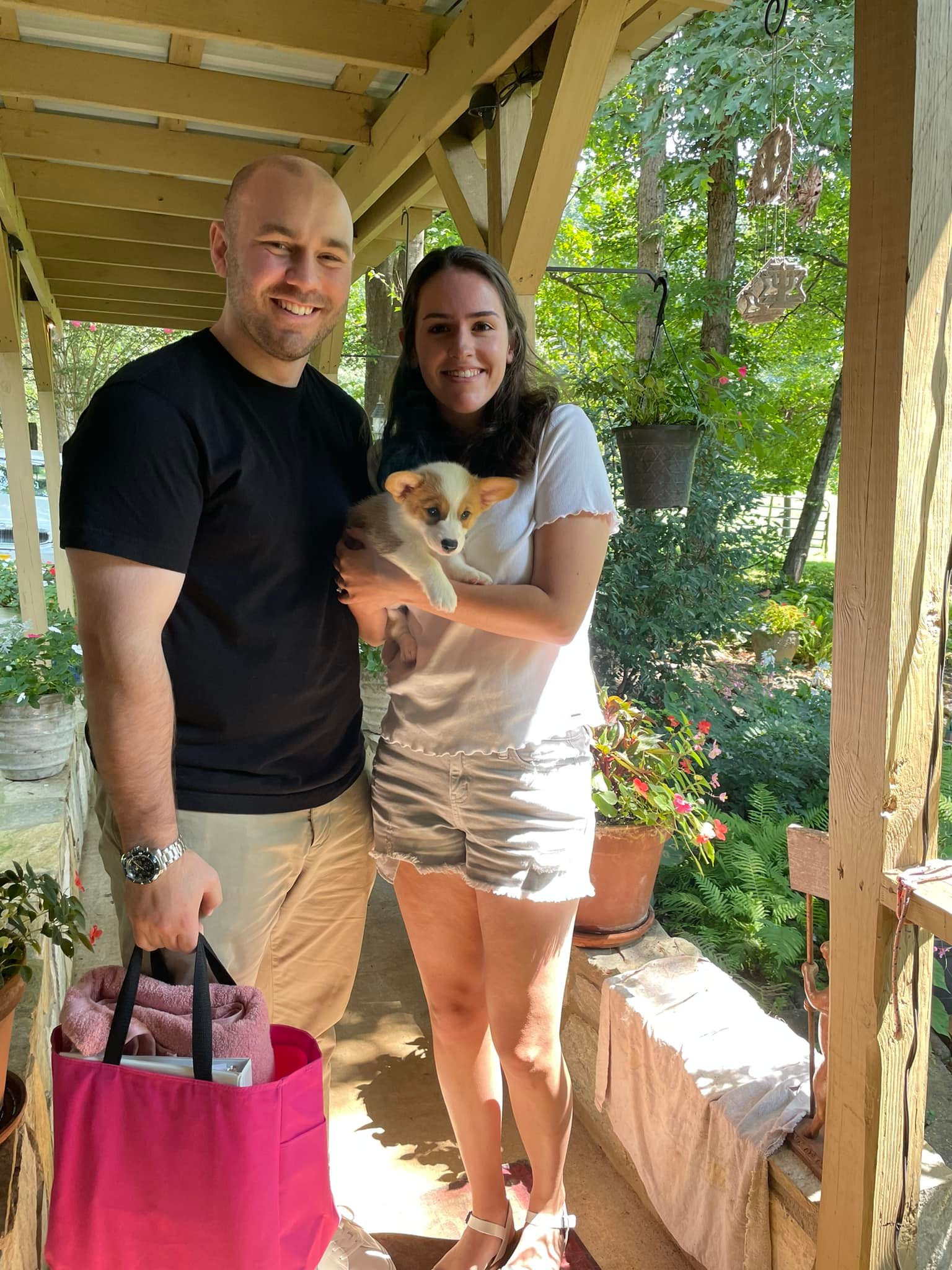 Happy family with new red and white pembroke welsh corgi puppy in NC