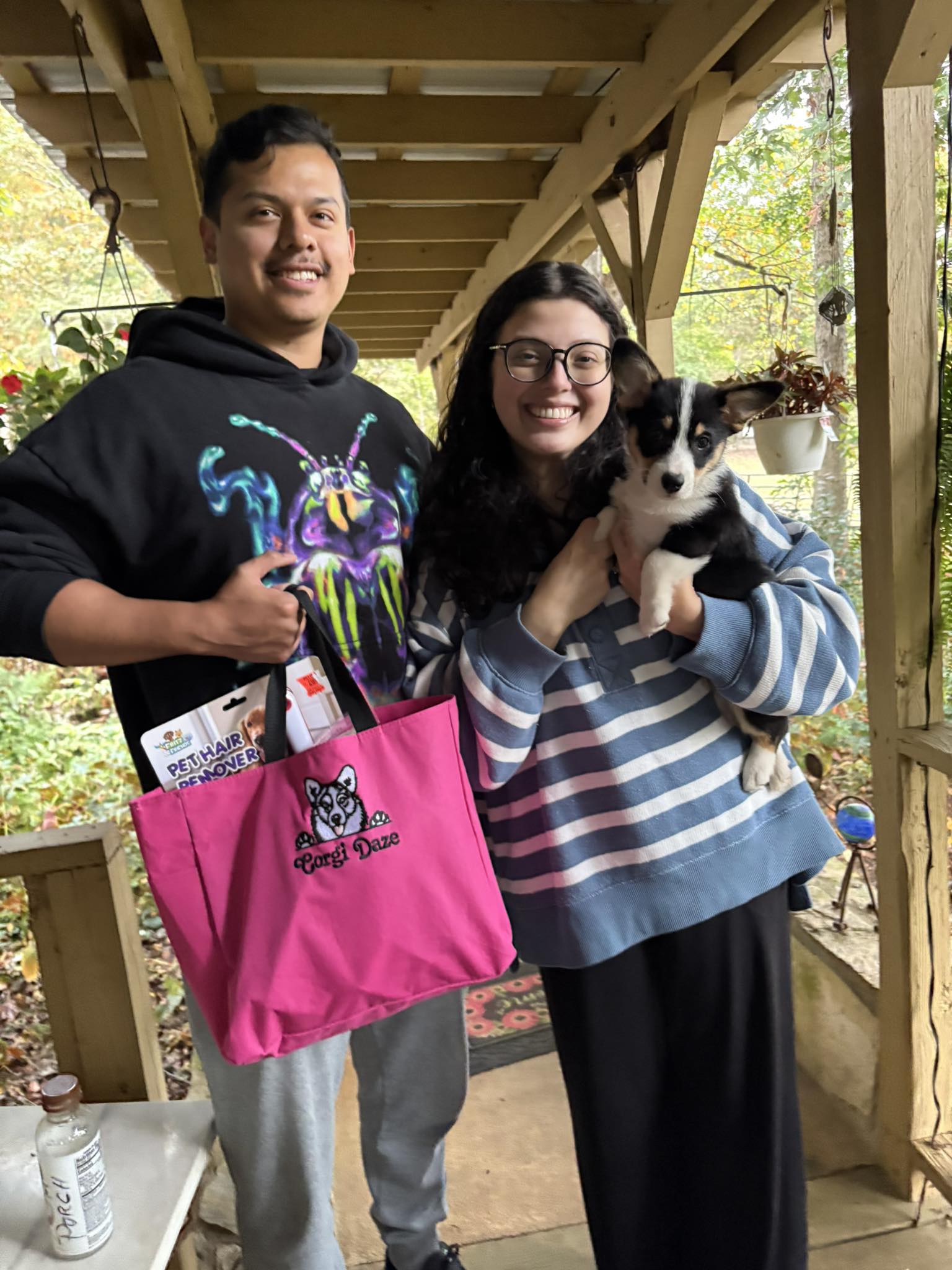Happy family with new tri-color pembroke welsh corgi puppy in NC